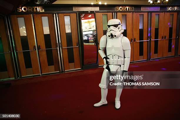 Person wearing a "stormtrooper" costume stands in front of the exit of the Grand Rex movie theatre during the "Darth Vader's trial" event in Paris,...
