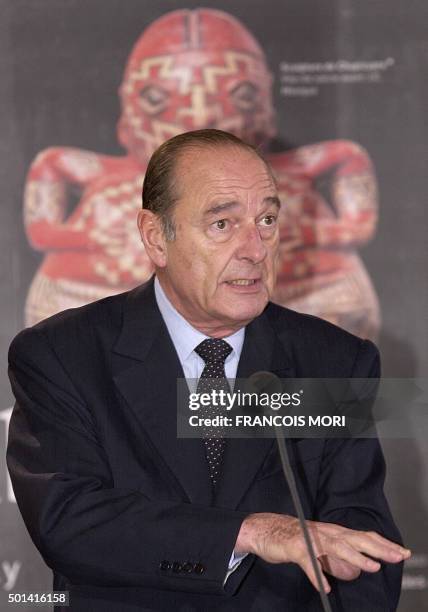 French President Jacques Chirac gestures as delivers his speech during the opening of the room devoted to arts and civilisations of Africa, Asia,...