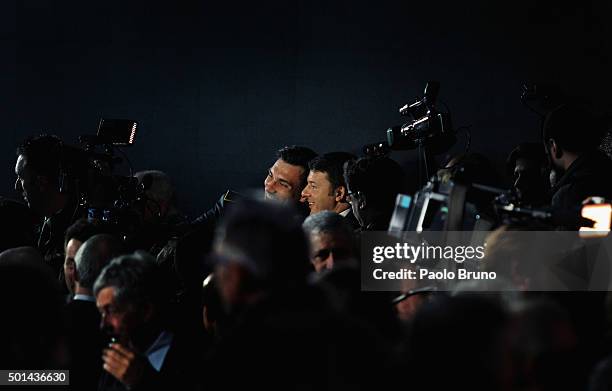 Italian Prime Minister Matteo Renzi takes a selfie with a fan during the Italian Olympic Commitee 'Collari d'Oro' Awards ceremony on December 15,...