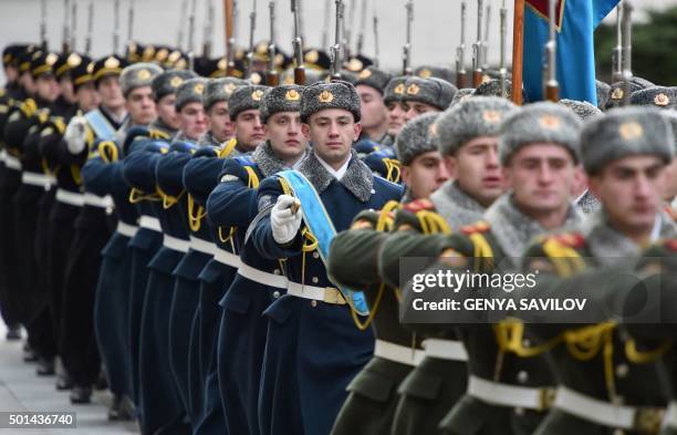 Honour guard soldiers stand at attention during a welcoming ceremony for the Poland's president Andrzej Duda ahead of his meeting with Ukraine's...