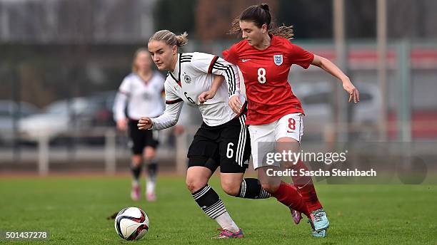 Lisa Schoeppl of Germany and Laura Hooper of England battle for the ball during the U17 girl's international friendly match between Germany and...