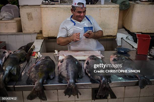 Fishmonger's stall with Pacu typical Amazonian fish at the market of Manaus, on the banks of the Rio Negro river in Amazonia, Brazil on December 11,...