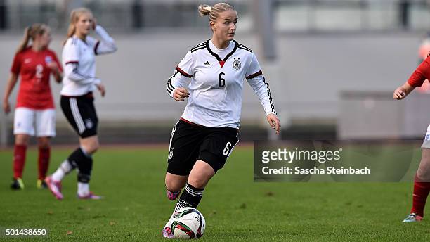 Lisa Schoeppl of Germany runs with the ball during the U17 girl's international friendly match between Germany and England on December 15, 2015 in...