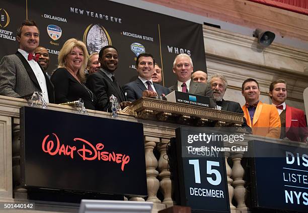 Desmond Howard, Rece Davis, Jim Byrne and George Zimmer ring the NYSE opening bell at New York Stock Exchange on December 15, 2015 in New York City.