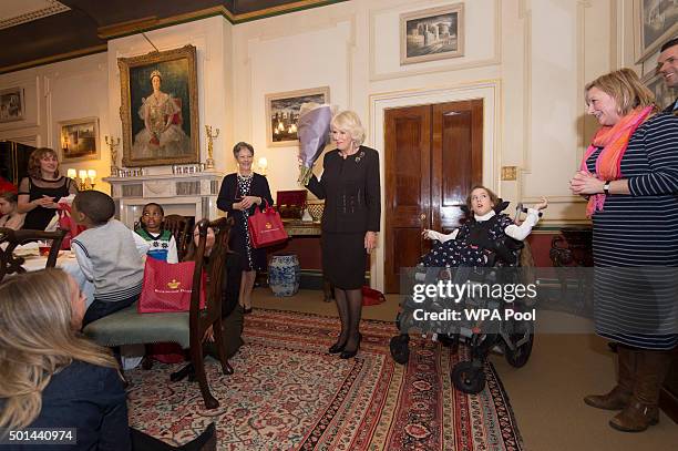 Camilla, Duchess of Cornwall, patron of the Helen & Douglas House and The London Taxidrivers' Fund invites underprivileged children from both...