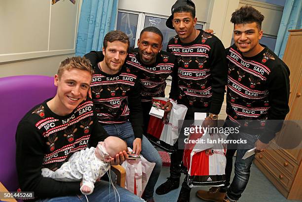 Sunderland players L-R Tom Beadling with baby Myles Johnson, Adam Matthews, Jermain Defoe, Patrick Van Aanholt and DeAndre Yedlin at Sunderland Royal...