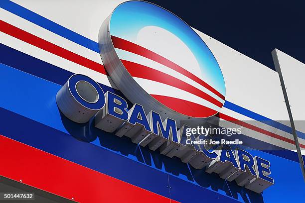 An Obamacare sign is seen on the UniVista Insurance company office on December 15, 2015 in Miami, Florida. Today, is the deadline to sign up for a...