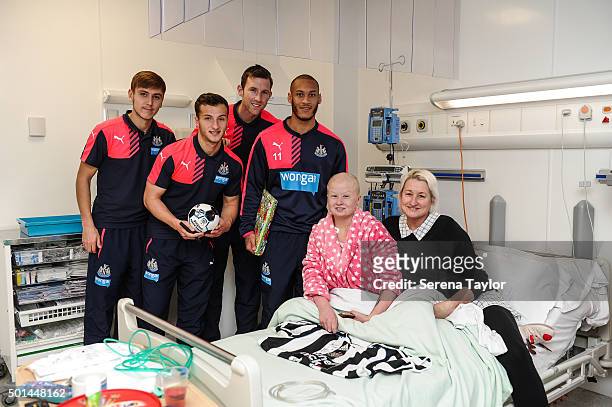 Newcastle Players seen L-R Liam Smith, Jamie Sterry, Mike Williamson and Yoan Gouffran pose for a photo after giving presents to a poorly child...