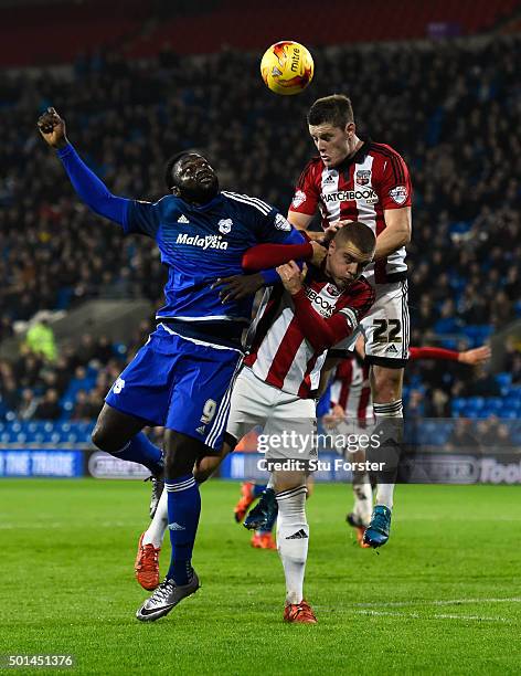 Kenwyne Jones of Cardiff is outjumped by Jack O' Connell of Brentford to the ball during the Sky Bet Championship match between Cardiff City and...