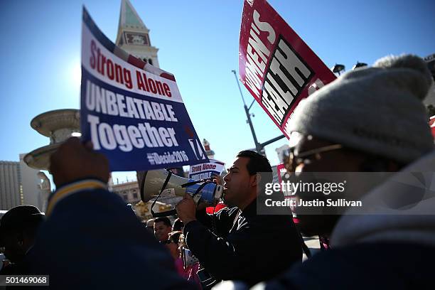 Protestors stage a demonstration before the start of the CNN republican presidential debate at The Venetian Las Vegas on December 15, 2015 in Las...