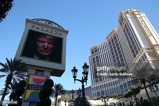 An image of republican presidential candidate Donald Trump appears on a marquee outside of the The Palazzo Las Vegas before the CNN republican...