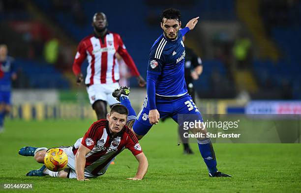 Tony Watt of Cardiff skips past Jack O' Connell of Brentford on the way to setting up the second goal during the Sky Bet Championship match between...