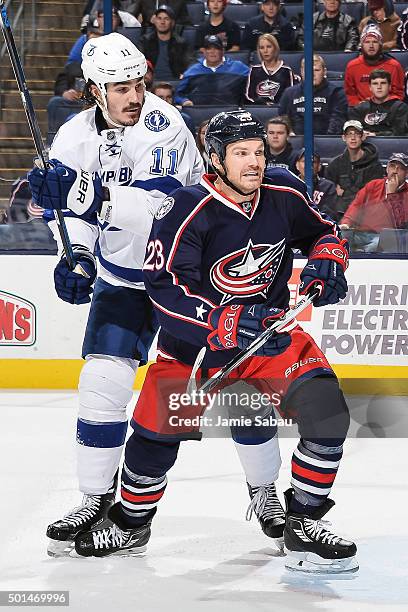 Brian Boyle of the Tampa Bay Lightning and David Clarkson of the Columbus Blue Jackets skate on December 14, 2015 at Nationwide Arena in Columbus,...