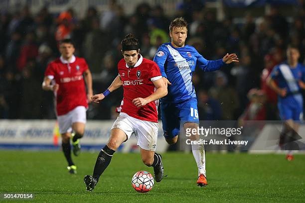 James Poole of Salford City competes with Nicky Featherstone of Hartlepool United during the Emirates FA Cup second round replay match between...