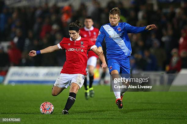 James Poole of Salford City competes with Nicky Featherstone of Hartlepool United during the Emirates FA Cup second round replay match between...