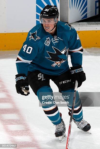 Ryan Carpenter of the San Jose Sharks spots puck on the ice against the Minnesota Wild during a NHL game at the SAP Center at San Jose on December...