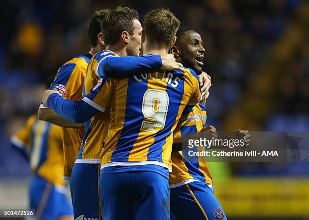Abu Ogogo of Shrewsbury Town celebrates after he scores to make it 1-0 during the Emirates FA Cup Second Round Replay between Shrewsbury Town and...