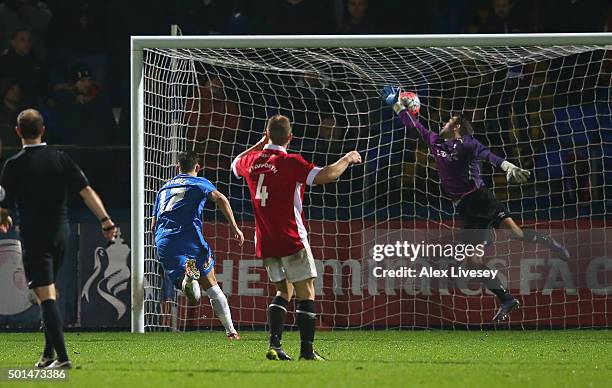 Scott Fenwick of Hartlepool United scores the first goal in extra time during the Emirates FA Cup second round replay match between Hartlepool United...