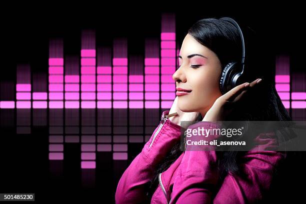 teenage girl listening music - amplified heat stock pictures, royalty-free photos & images