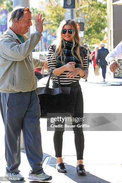 Fergie and her father Jon Patrick Ferguson are seen on December 15, 2015 in Los Angeles, California.