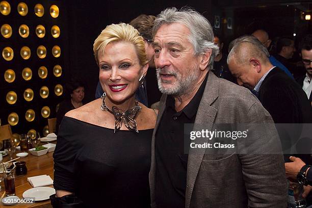 American actor Robert De Niro and Raquel Bessudo pose for pictures during the inauguration of the oriental restaurant Nobu Polanco on December 09,...