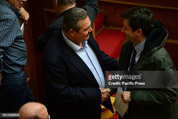 Handshake between Panos Kamenos Minister of Defence and leader of "Independent Greeks" party and alternate Minister of Finance Giorgos Houliarakis...
