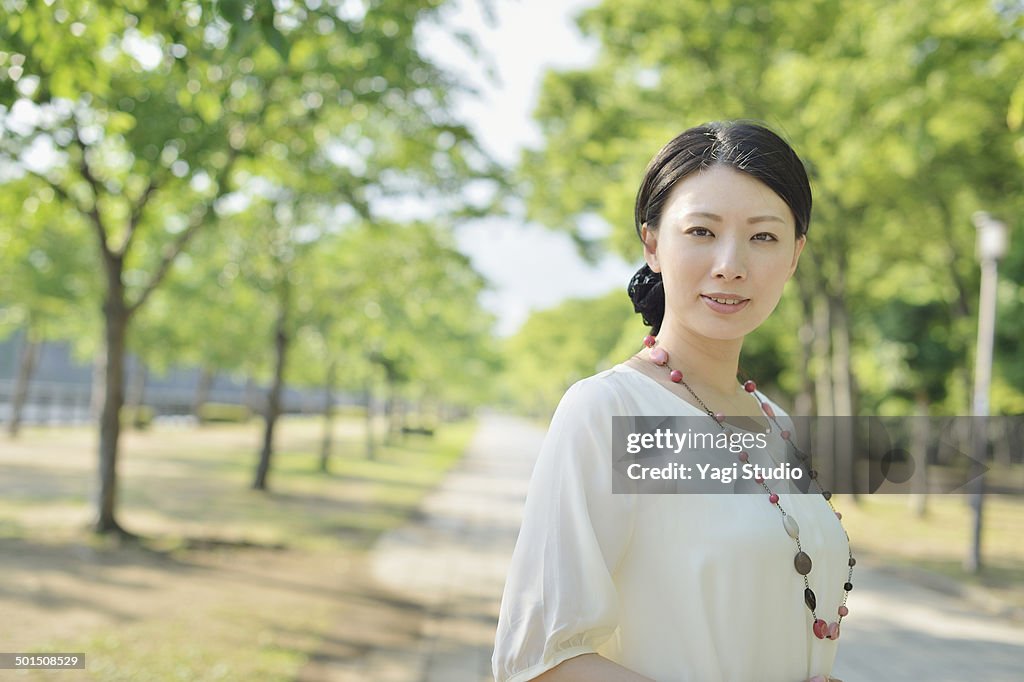Woman standing in park