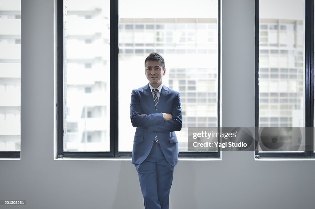 Portrait of confident businessman in office