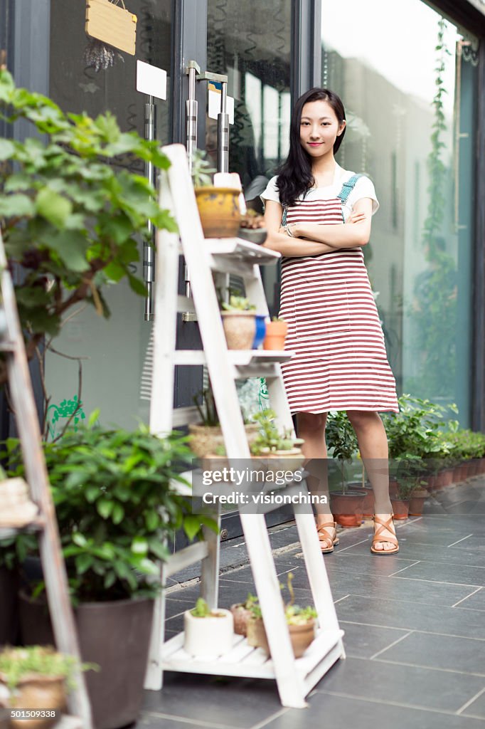 Chinese girl wearing an apron