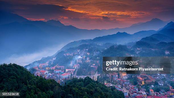 sunset over sapa city - sapa stockfoto's en -beelden