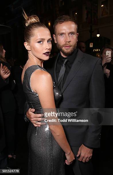 Teresa Palmer and Mark Webber attend the premiere of Warner Bros. Pictures and Alcon Entertainment's "Point Break" at TCL Chinese Theatre on December...