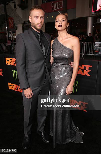 Mark Webber and Teresa Palmer attend the premiere of Warner Bros. Pictures and Alcon Entertainment's "Point Break" at TCL Chinese Theatre on December...