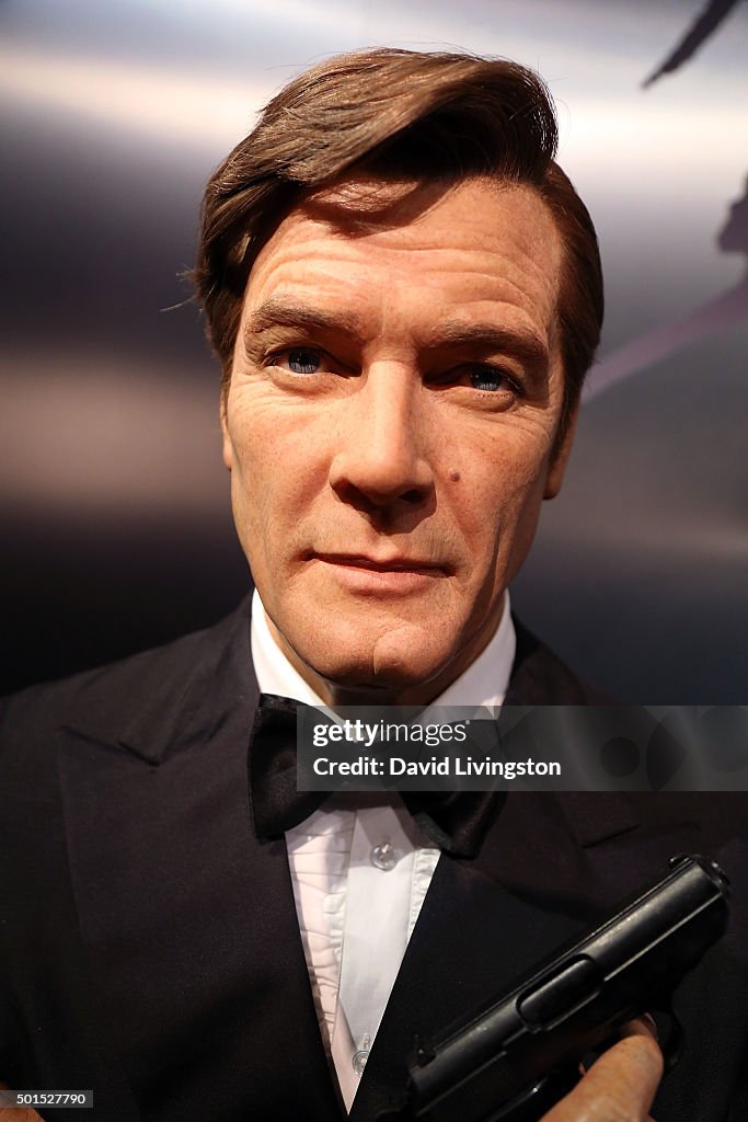 A wax figure of actor Roger Moore is seen at Madame Tussauds... News ...