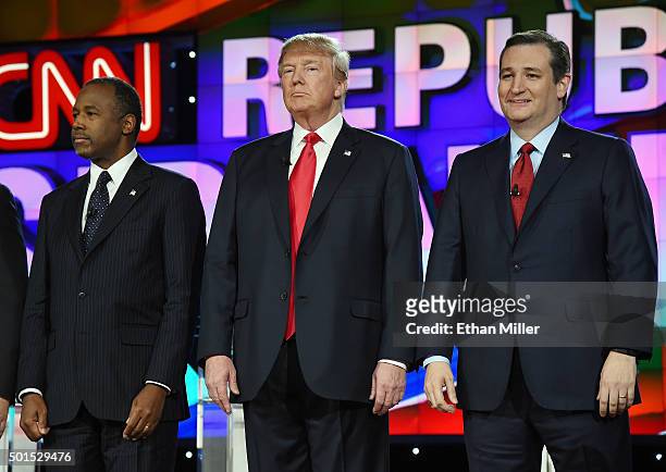 Republican presidential candidates Ben Carson, Donald Trump and Sen. Ted Cruz stand onstage during the CNN presidential debate at The Venetian Las...