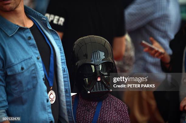 Young fan dressed as a Star Wars character arrives at the Australian premier of 'Star Wars: The Force Awakens' in Sydney on December 16, 2015. Star...