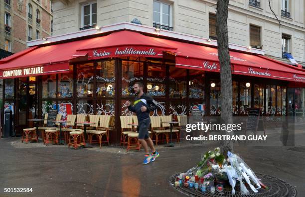 This picture shows the terrace of the brasserie Le Comptoir Voltaire near Place de la Nation in eastern Paris on the day of its reopening on December...