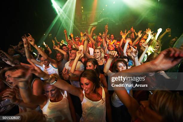 enjoying every song the band plays - entertainment-club stock pictures, royalty-free photos & images