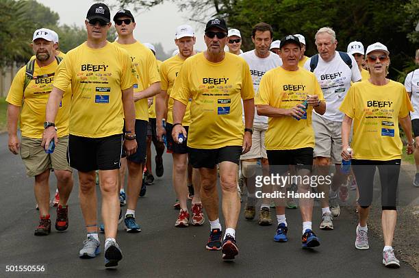 In this handout image provided by Philip Brown, Sir Ian Botham and his supporters walk during the 'Beefy Walking the Rainbow Nation' charity walk...