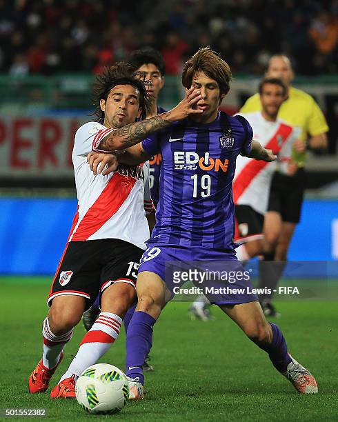 Leonardo Pisculich of River Plate tackles Sho Sasaki of Sanfreece Hiroshima during the FIFA Club World Cup Semi Final match between Sanfrecce...
