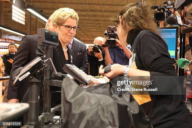 Premier Kathleen Wynne is carded after making an announcement, alongside Minister Charles Sousa, at the Loblaws at 17 Leslie Street which is the...