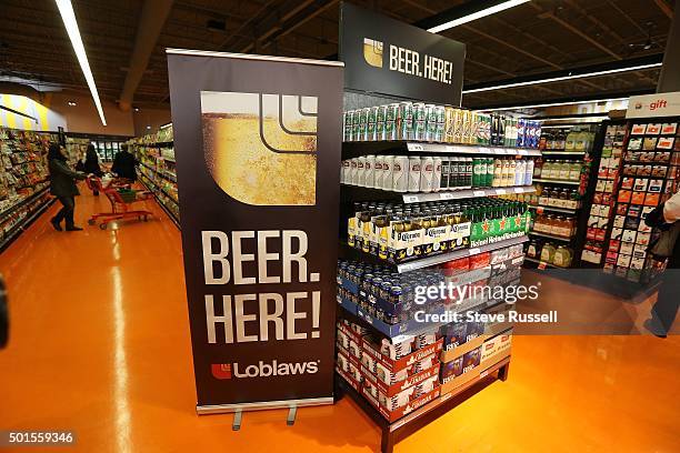 Premier Kathleen Wynne makes an announcement, alongside Minister Charles Sousa, at the Loblaws at 17 Leslie Street which is the first grocery store...