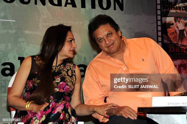 Indian Bollywood actress and politician Jaya Prada speaks with producer Shashi Ranjan as they form part of the jury for the third National Yash...