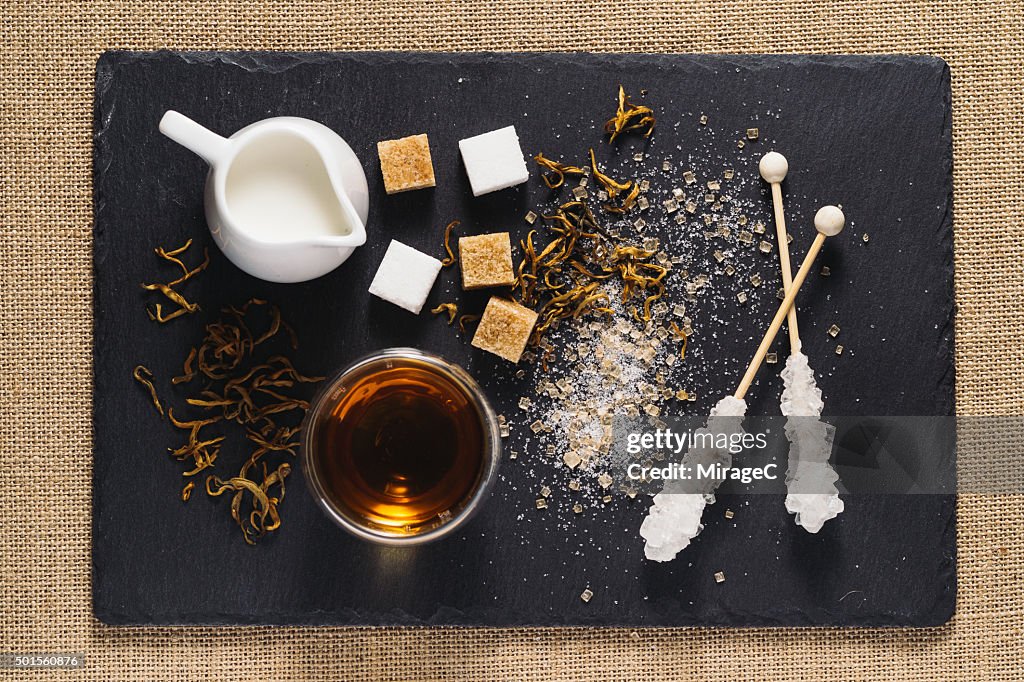 Black Tea, Cream and Sugar on Rustic Stone Tray