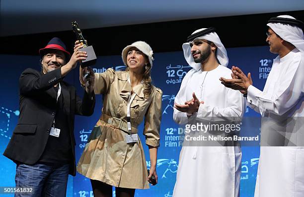Director Mahmood Soliman winner of the Muhr Feature Non Fiction award for "We Have Never Been Kids" with Sheikh Mansoor bin Mohammed bin Rashid Al...
