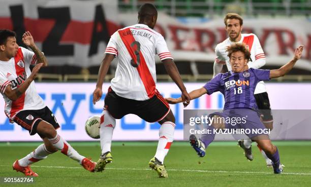Sanfrecce Hiroshima defender Sho Sasaki shoots against River Plate during the Club World Cup semi-final football match in Osaka on December 16, 2015....