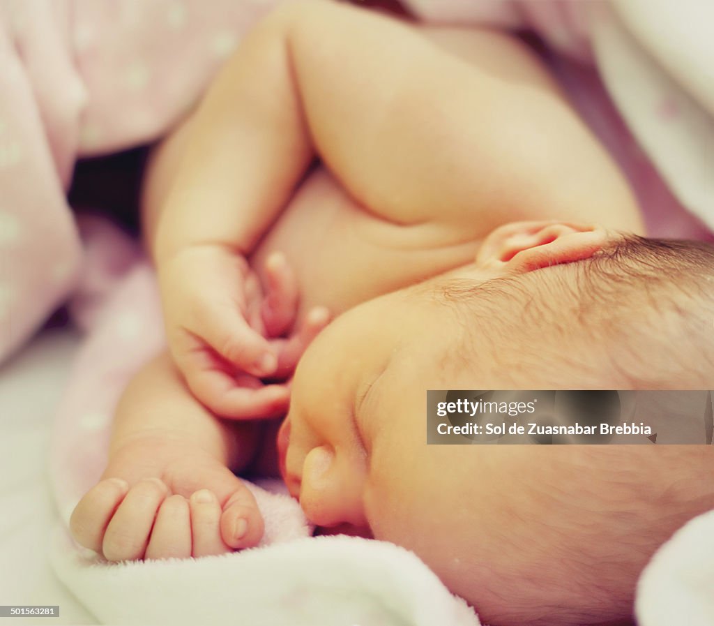 Tender image of a newborn baby sleeping
