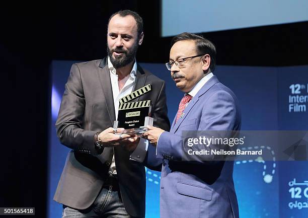 Actor Ali Suliman with the People's Choice award for "The Idol" during the Muhr Awards on day eight of the 12th annual Dubai International Film...