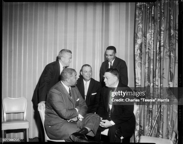 Group portrait of guests at an NAACP Human Rights dinner in the Hotel Penn Sheraton, Pittsburgh, Pennsylvania, May 1961. Pictured are, from left,...