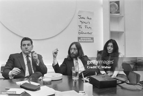 American businessman Allen Klein with John Lennon of The Beatles, and Lennon's wife, Yoko Ono, 29th April 1969. Klein is representing Lennon in...