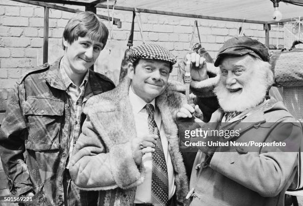 English actors Nicholas Lyndhurst, David Jason and Buster Merryfield in character as Rodney Trotter, Derek 'Del Boy' Trotter and Uncle Albert from...